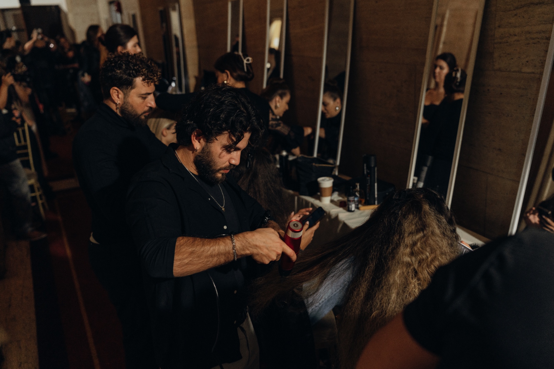 Backstage stylists at work